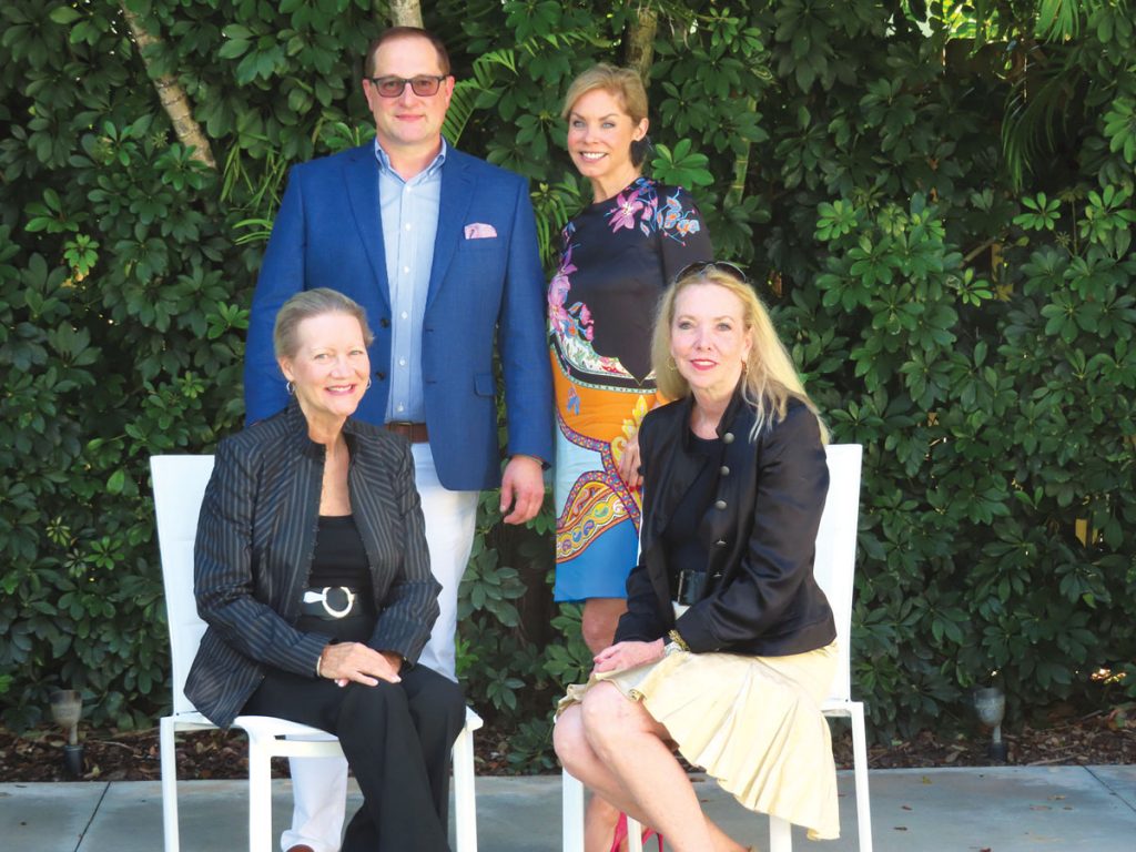 Event co-chairs Karen Loeffler and Melinda Cooper (seated), are passing the torch to vice co-chairs Gregory Allan Ness and Leslie Bergstrom for the 2023 FMA event