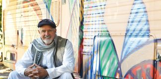 The “Art V,” an RV painted by Ross Power’s son Pablo, sits in the backyard of Power’s Edgewood home. He’s planning to use the Art V as the backstage space for the lychee tree events