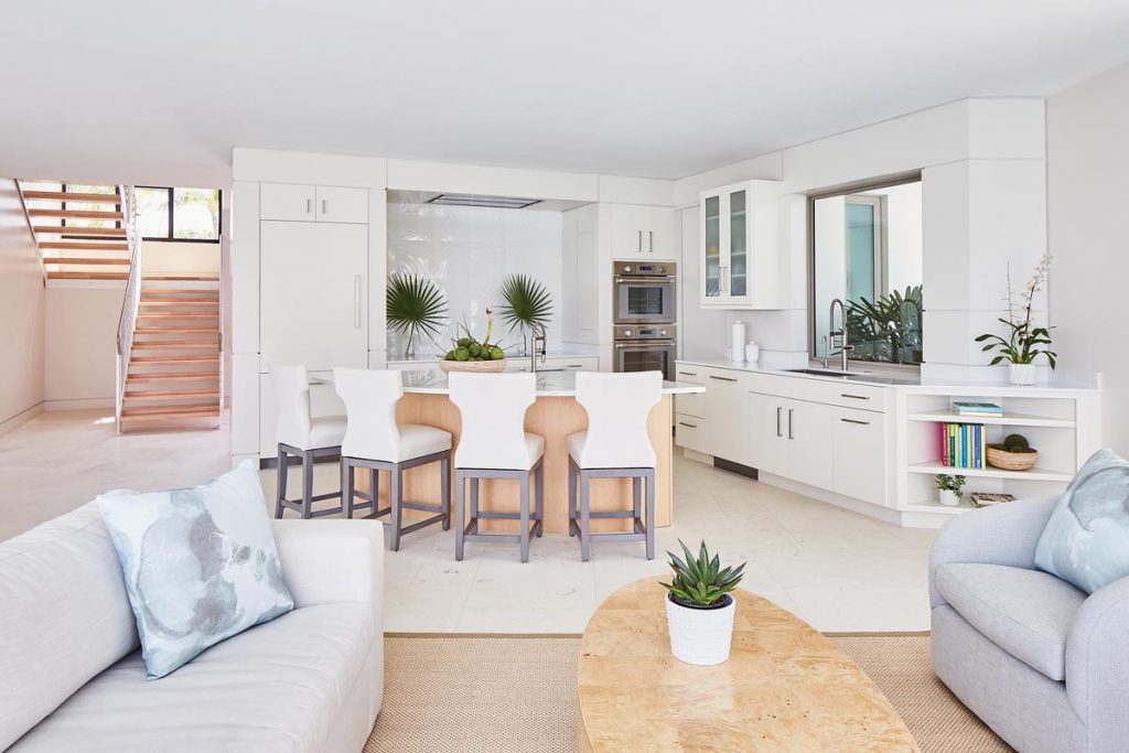 Thermador appliances, Pompeii quartz countertops, and performance fabrics that aren’t fazed by six grandchildren eating black raspberry jam create a functional kitchen in a contemporary style.