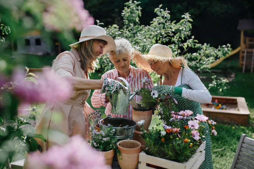 Inviting friends over for a gardening party can make quick work of some planting tasks