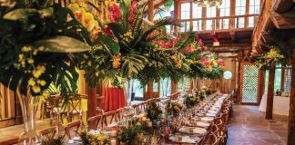 The decor reflects the enormity of the mahogany table it’s presented on, along with the size of the Hall of Giants at McKee Botanical Garden. Photo by Marion de Vogel