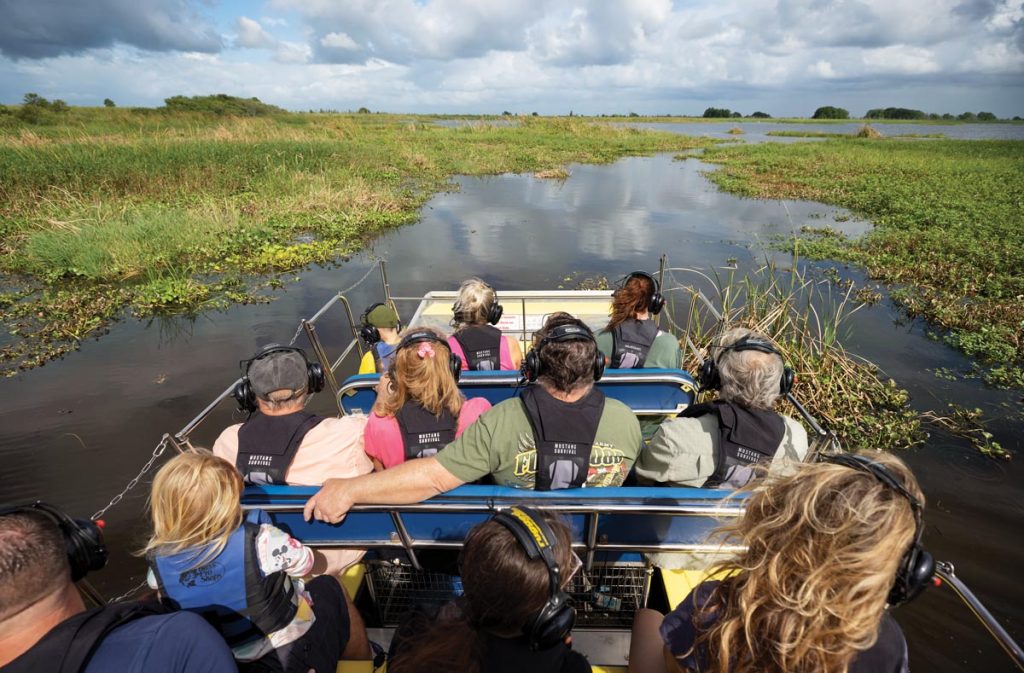 Capt. Bob’s airboat is full of eager tourists. Photo by Sam Wolfe