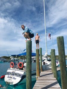 Junior chaperone Will Dunlap and student Walter prepare to do backflips. Photo by Teresa Lee Rushworth