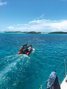 The dinghy motors to a reef for snorkeling. Photo by Teresa Lee Rushworth