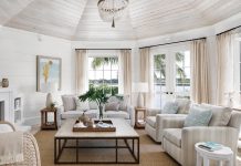 Laid-Back Luxury on John’s Island The family room is lightened up with whitewashed cypress wood ceilings. Photo by Jessica Glynn Photography