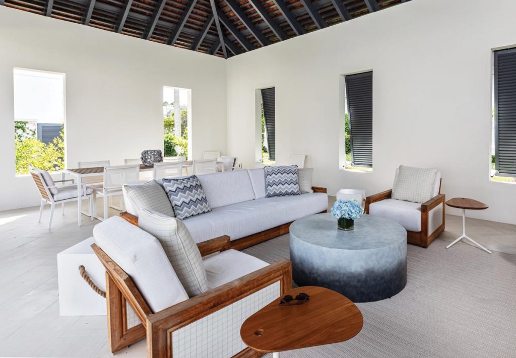 Spacious outdoor living areas are used for meals, relaxation, and fun. Photo by Owen McGoldrick Photography