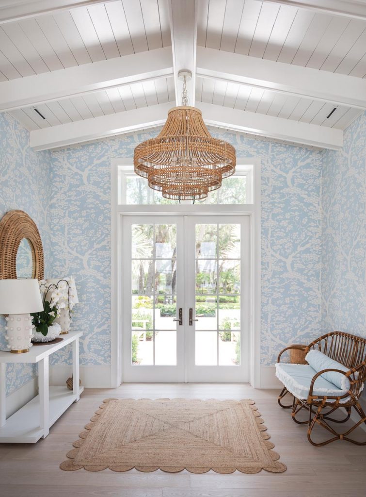 The walls in the foyer, above, are covered in Meg Braff–designed wallpaper that both mother and daughter love. Photo by Robyn Flick