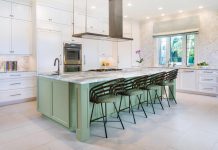 Bringing Stone into Every Room Coastal Interiors uses large-scale slabs of stone in every room of the house, including on the kitchen island and countertops. Photo by Owen McGoldrick