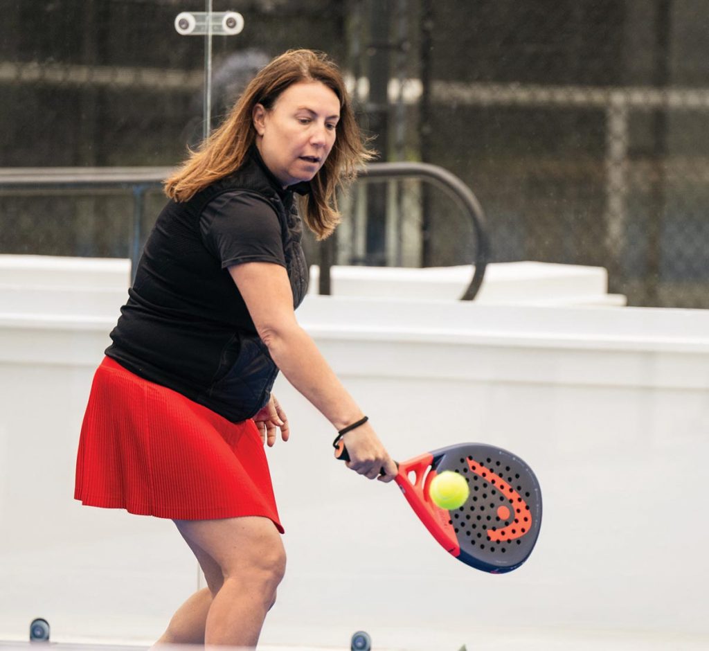 Terri Randazzo returns a shot at the Boulevard Tennis & Padel Club. Photo by Steven Martine