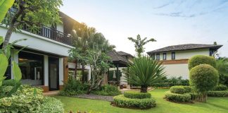 Only when your grass begins showing true distress should watering commence. Photo courtesy of Adobe Stock