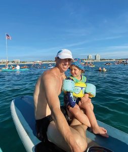 Flynn Fidgeon and son Andrew enjoy the float out to the flag in 2021
