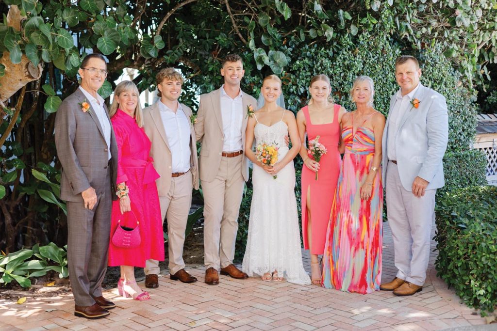Scott and Alison Douglas, Andrew Douglas, the groom, the bride, Kendall Schlitt, Karen and Frank Schlitt. Photo by Alex Musil Photography
