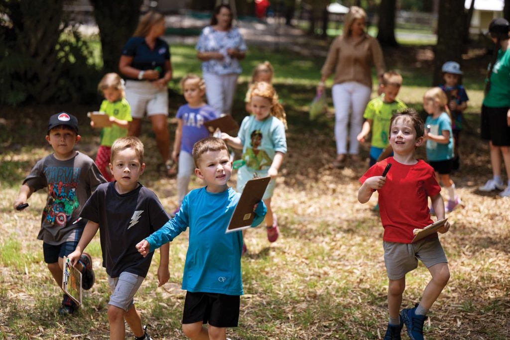 A day at Maitland Farm can include some exploration time along the nature trail behind the school. Photo by Steven Martine