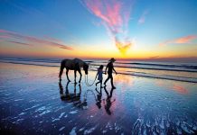Set Out on Epic Summer Adventures Across Florida Tour the beach along Amelia Island on horse-back. Photo by Peter W. Cross and Patrick Farrell for Visit Florida