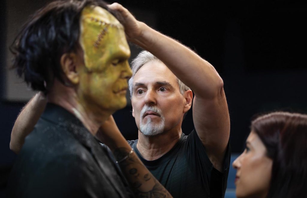 Volsky and makeup assistant Angely Callejas work on actor Rob Kenna’s transformation for Young Frankenstein. Photo by Sam Wolfe