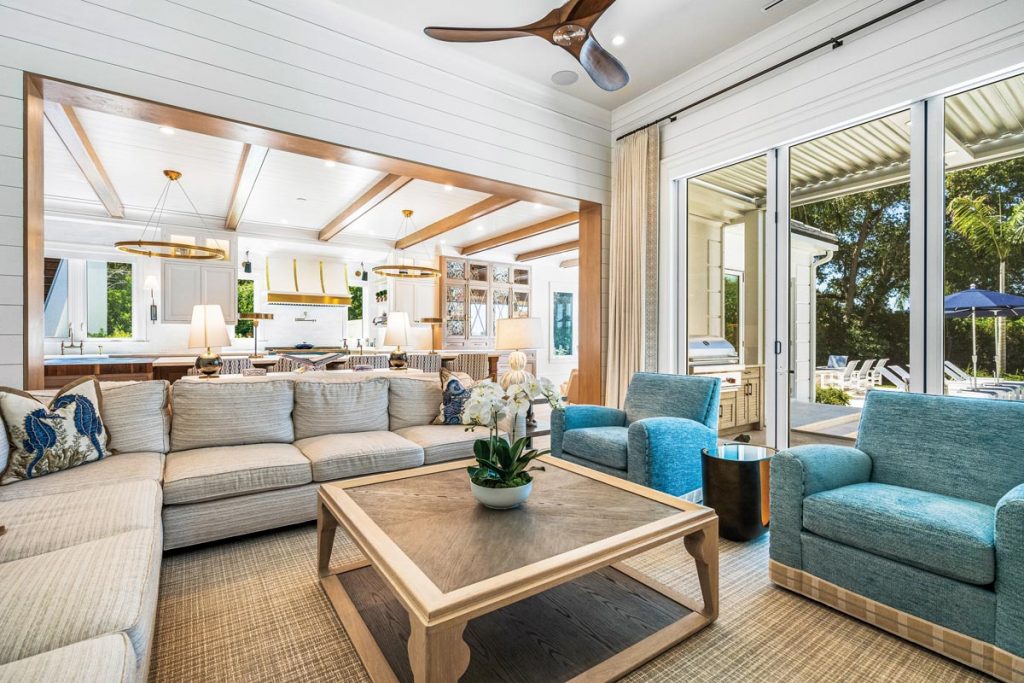 A living space next to the kitchen, top, has a relaxed feel and overlooks the pool. Photo by M. James Northen