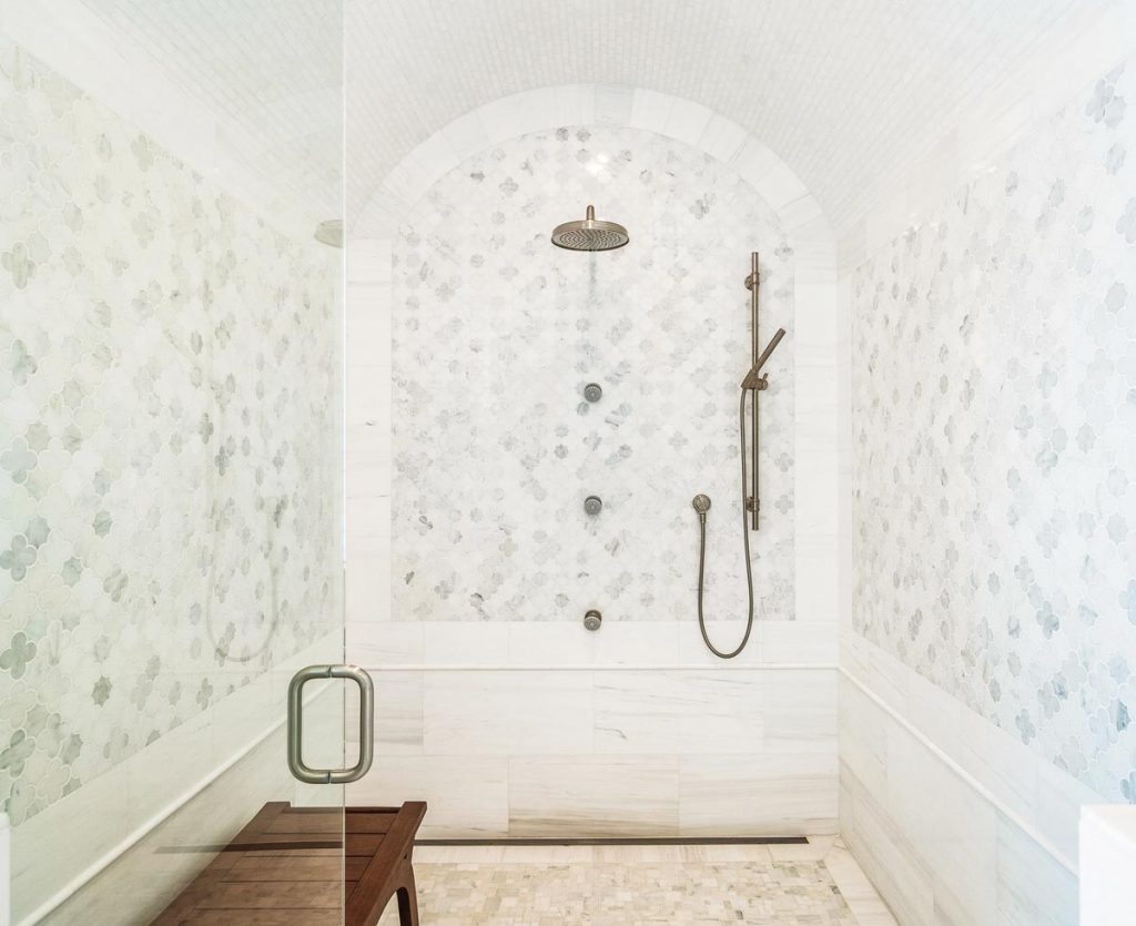 Bathrooms throughout the home have coastal accents. Photo by M. James Northen