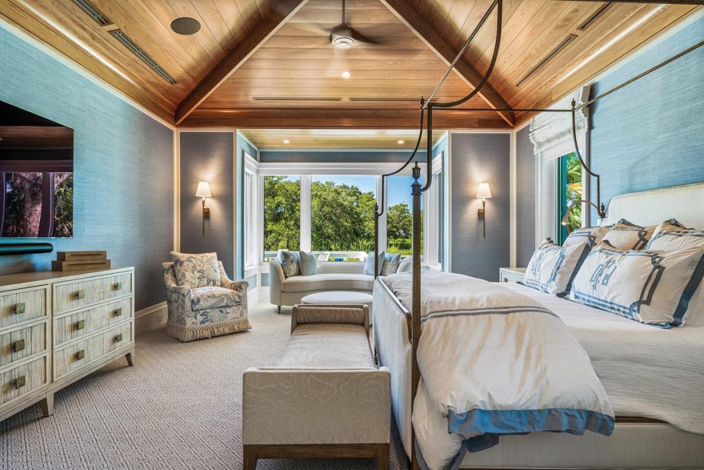 Bedrooms have textured ceilings and walls, along with views of the gorgeous scenery outdoors. Photo by M. James Northen