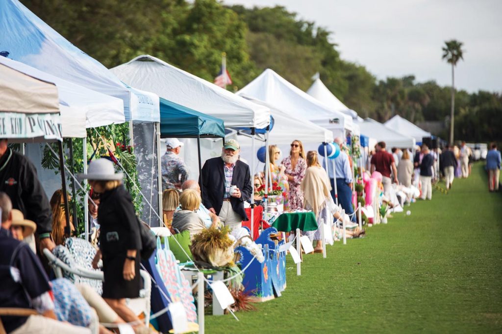 Tailgate participants are just feet from the action along the field while enjoying the matches from the comfort of their themed tents. Photo courtesy of Windsor