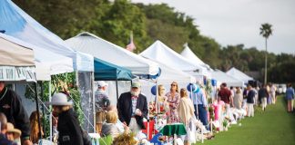 Tailgate participants are just feet from the action along the field while enjoying the matches from the comfort of their themed tents. Photo courtesy of Windsor