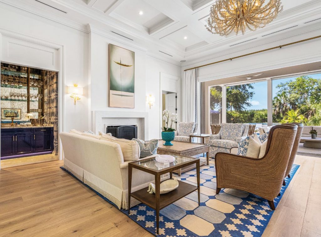 Wide-plank white oak floors placed in varying lengths throughout the home add warmth, complementing the wood accents in each space. Photo by M. James Northen