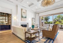 John’s Island Home Unveils a New Look Wide-plank white oak floors placed in varying lengths throughout the home add warmth, complementing the wood accents in each space. Photo by M. James Northen