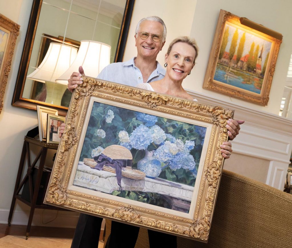 Bob and Bonnie hold Hydrangeas by Bonnie. Photo by Steven Martine