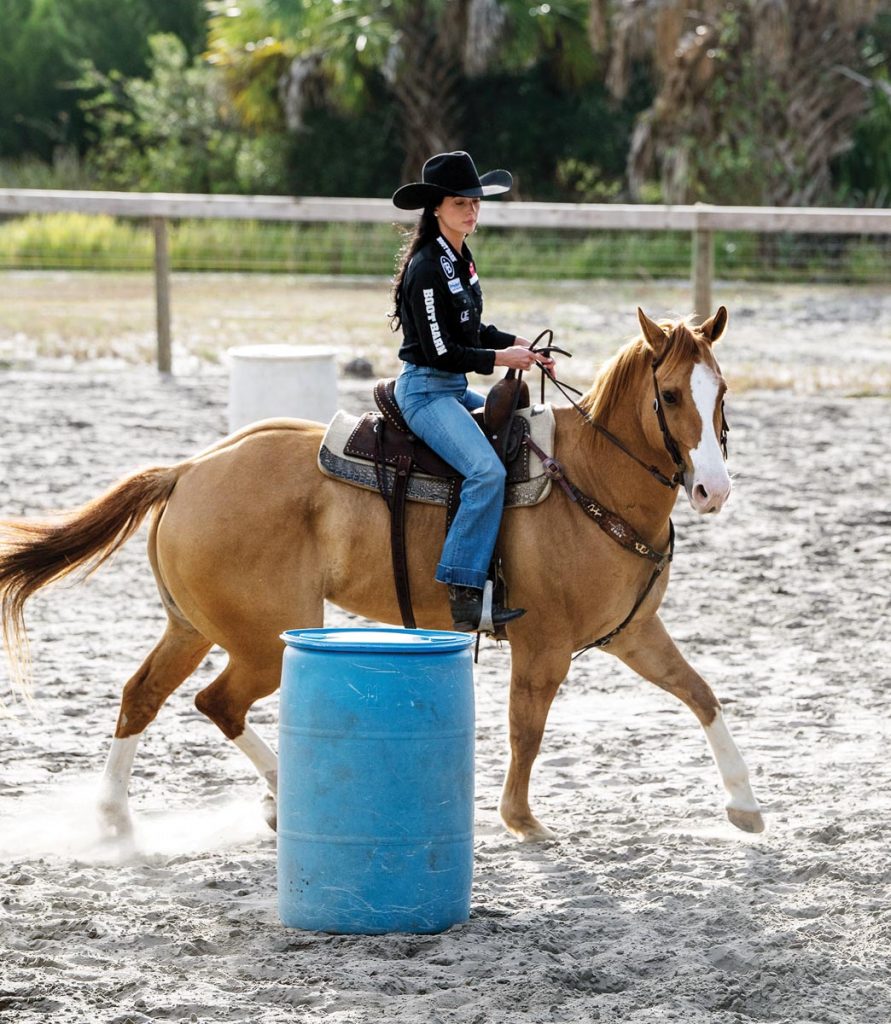 Shaye runs Ace through the barrels. Photo by Steven Martine