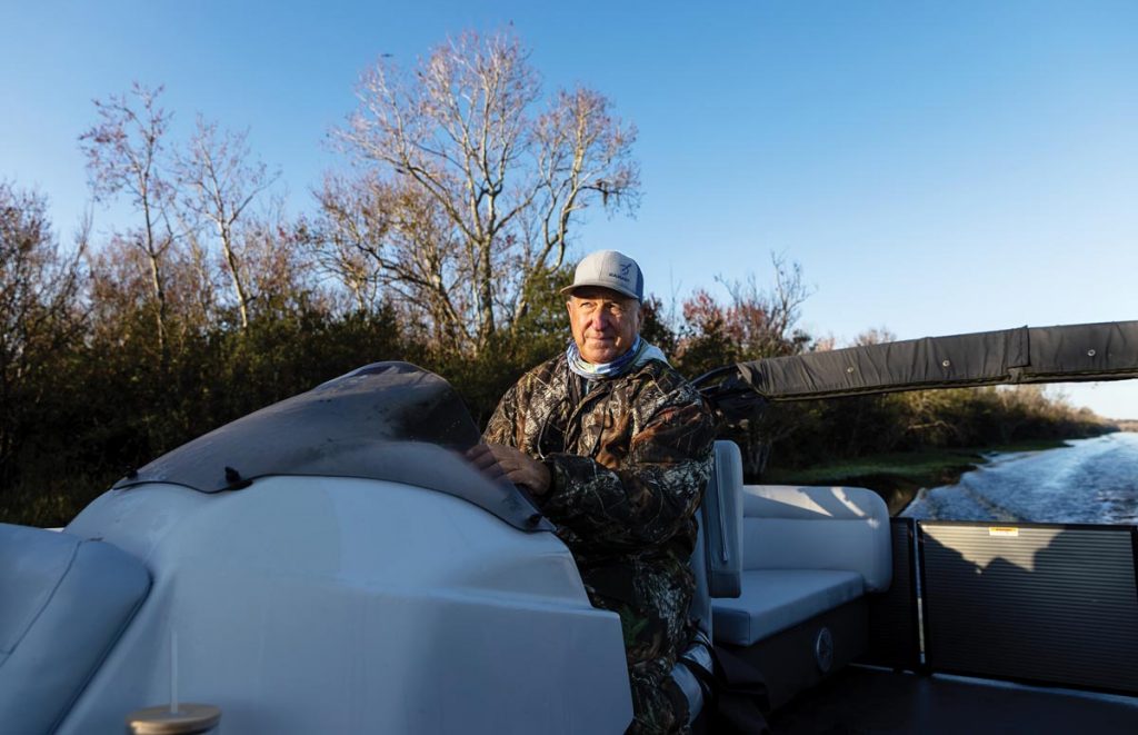 Roy Bass has been guiding fishermen on the lake for decades. Photo by Sam Wolfe