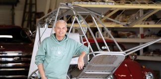 The Drifter ultralight is suspended from the ceiling of Roy Pinner’s hangar ahead of its final trip to the EAA Aviation Museum, while Pinner leans against his newest project, a STOL copy