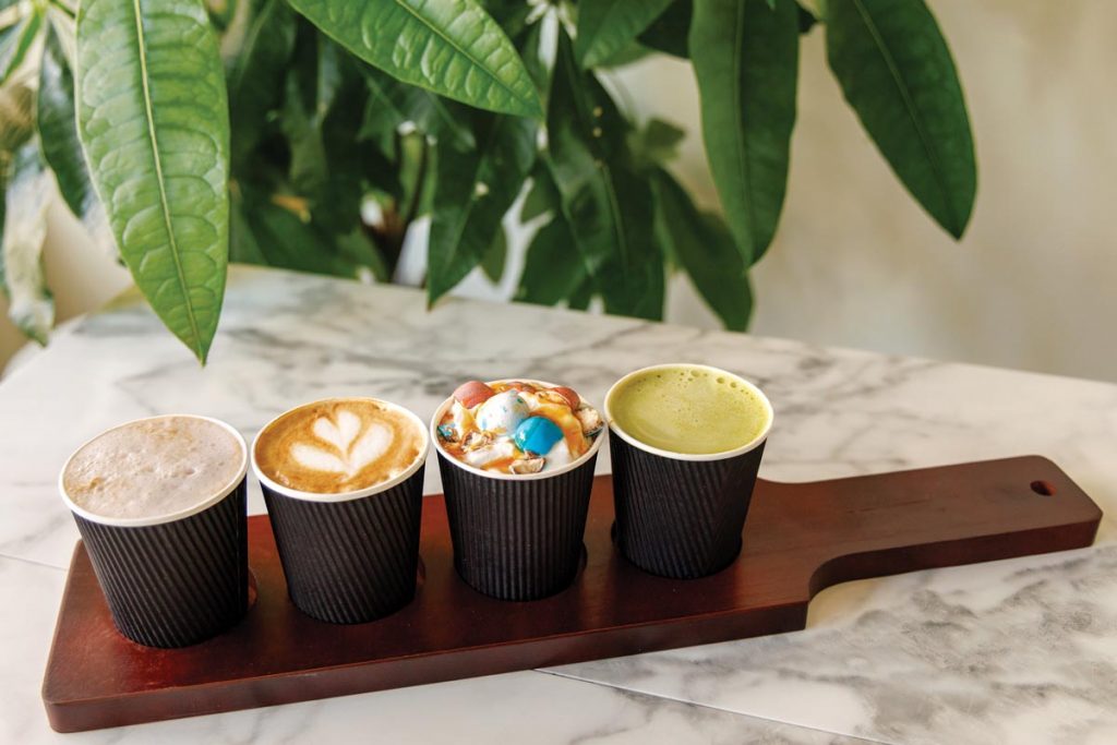 A latte flight at Night Owl Coffee Bar