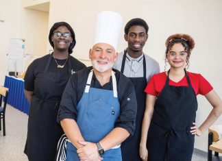 Building Futures at Youth Guidance Mentoring Academy Chef Brannon Soileau with students Nina, Moses, and Melany. Photo by Steven Martine