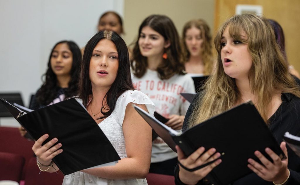 First-year sopranos Trinity Kegg and Eryn Lawson bring fresh voices to the choir. Photo by Steven Martine