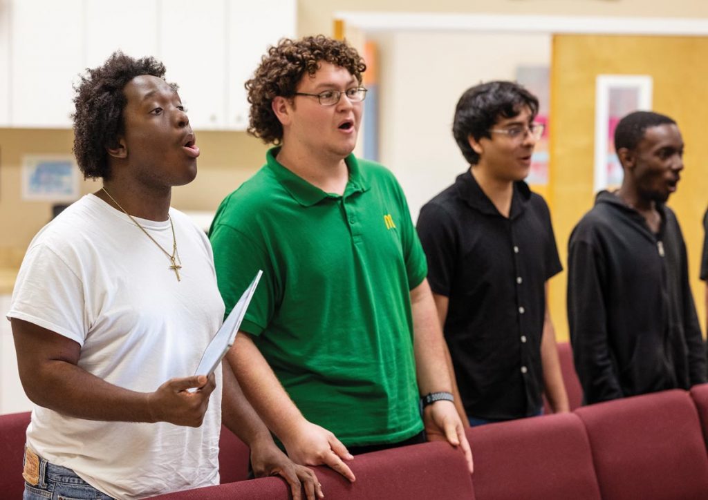 Frantz Matador, Daniel Giannelli, Jahaziel Hernandez, and Jordan McPherson hold down the bass section of the First Presbyterian youth choir. Photo by Steven Martine