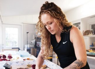 The Stunning Resin Art of Kiersten Ketcham Kiersten Ketcham works on a walnut coffee table incorporating flowers from a Montana bride’s wedding bouquet. Photo by Steven Martine