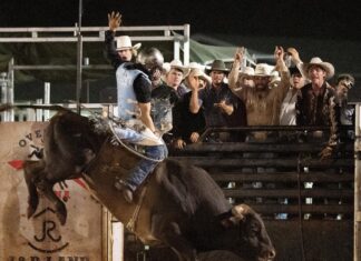 Overpass Arena Brings Rodeo to Vero Beach Saturday night champion bull rider Jeferson Silva. Photo by Steven Martine