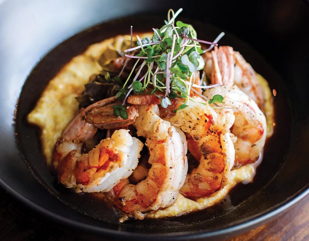 Shrimp & Grits with Collard Greens. Photo by Kim Bottalico